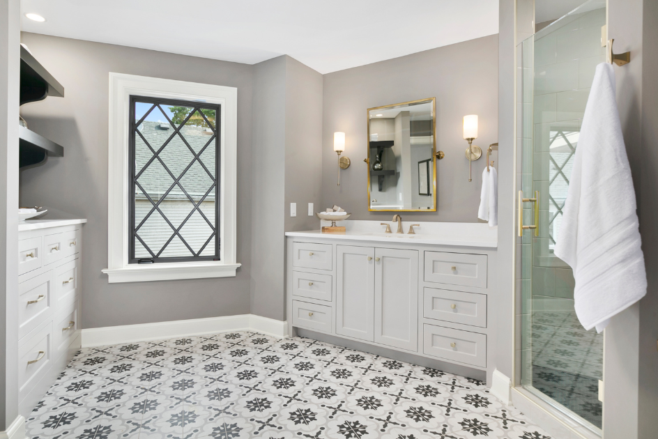 bathroom with black and white tile